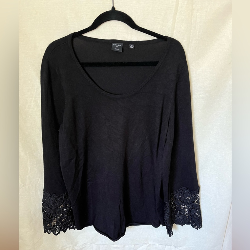 Black sweater with lace pattern details